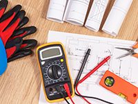 Electrical construction drawings or diagrams, multimeter for measurement in electrical installation and accessories for engineer jobs